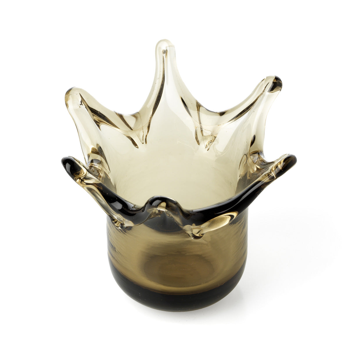 Glass crown-shaped candle holder on a white background
