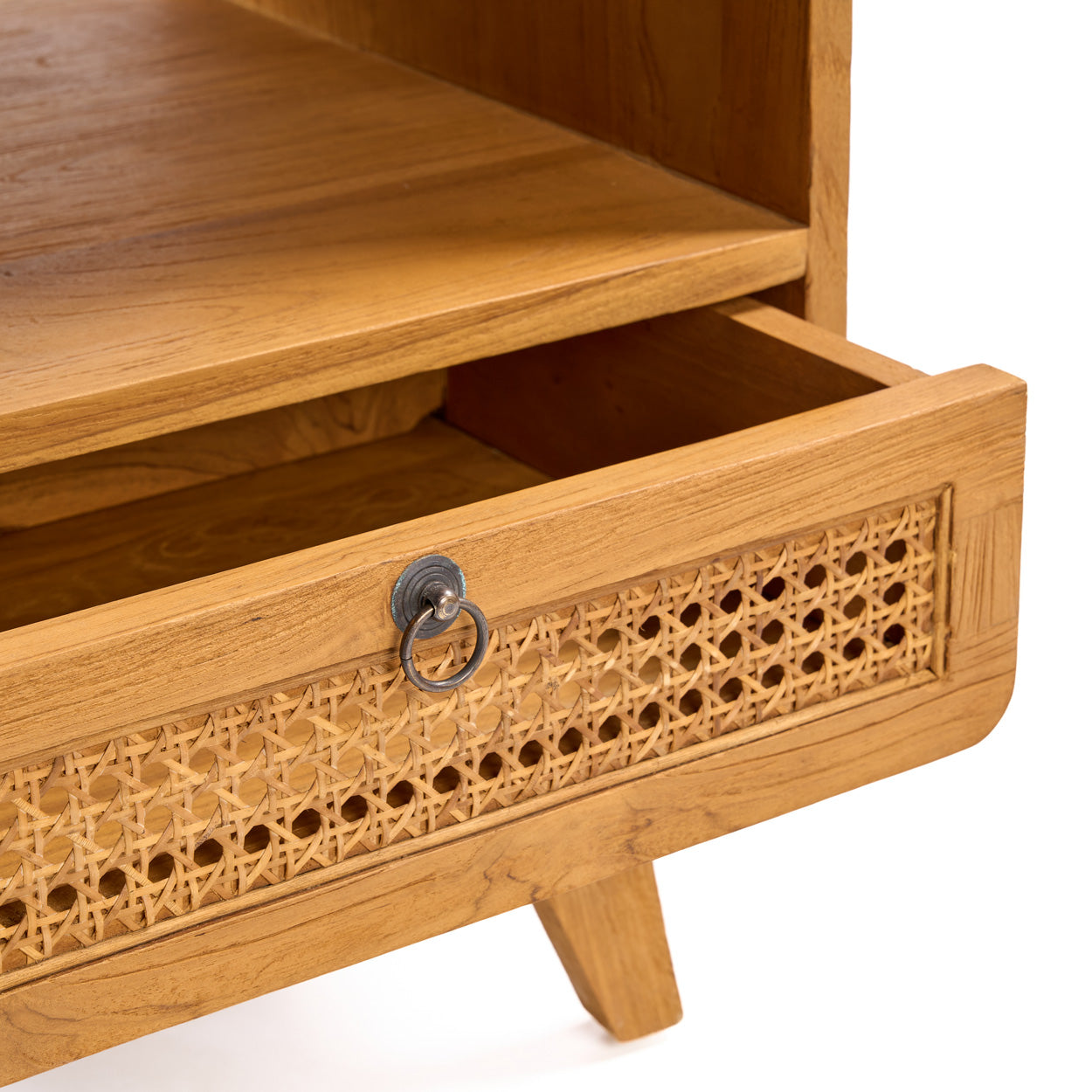 Wooden drawer with wicker panel and metal handle on a white background