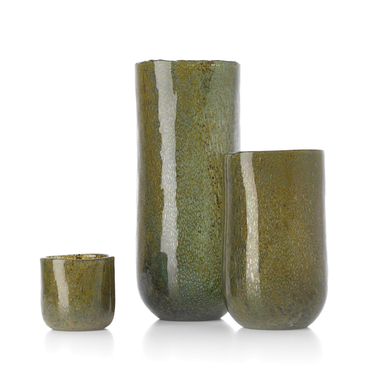 Two green glass vases and candle holder on a white background