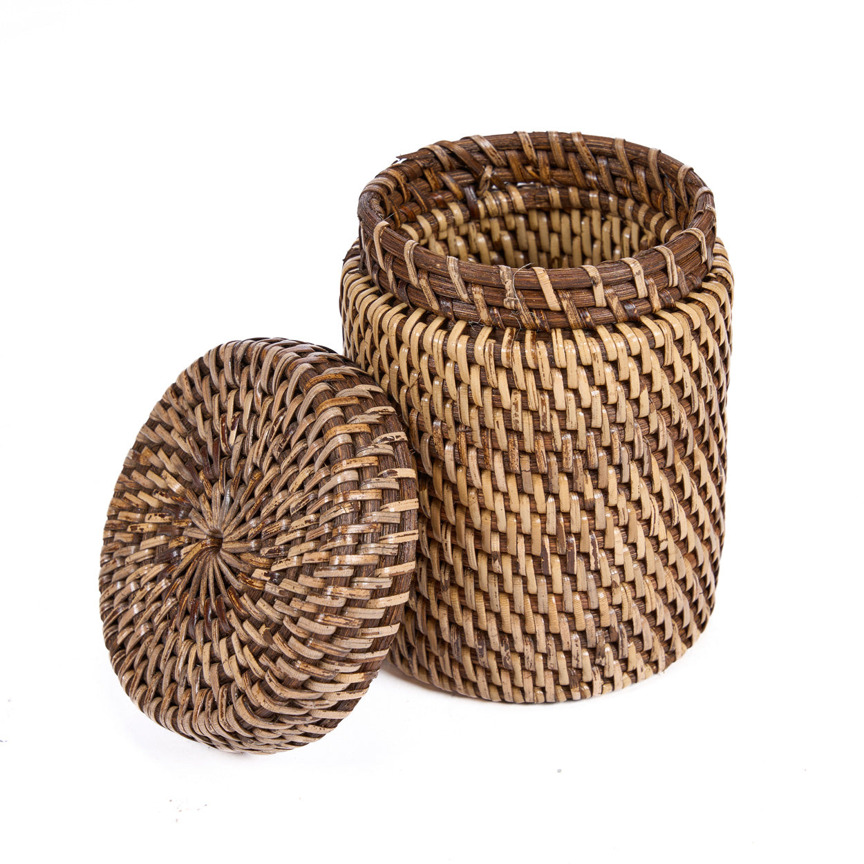 Woven rattan basket on a white background