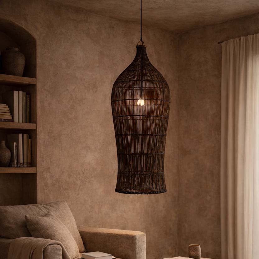 Cozy living room with a textured wall, rattan pendant lamp, and wooden furniture.