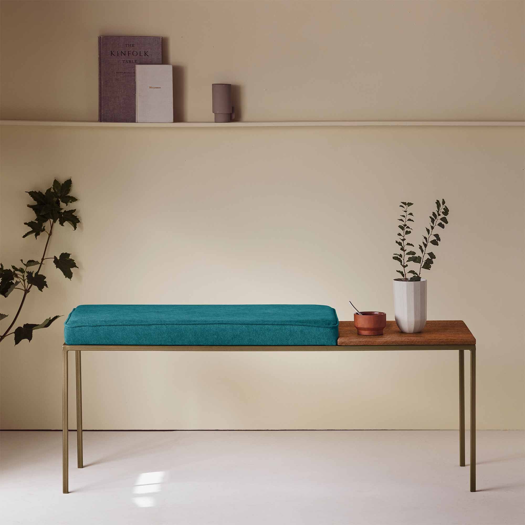 Beech Wood Seat, Walnut Colour blue fabric, yellow frame, front interior view, with books and vase