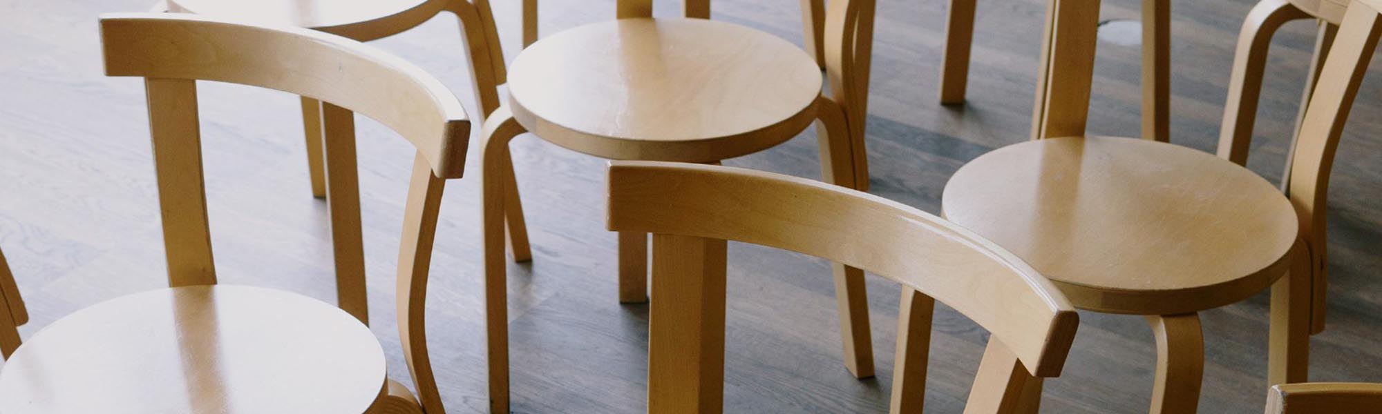 Wooden stools in a minimalist style in the living room