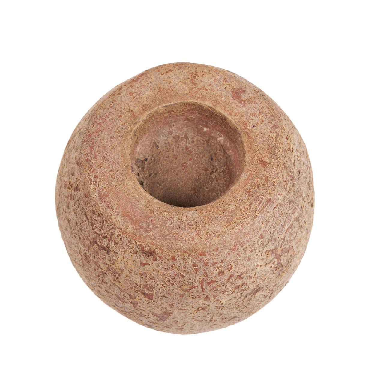 Round terracotta candle holder from above on a white background