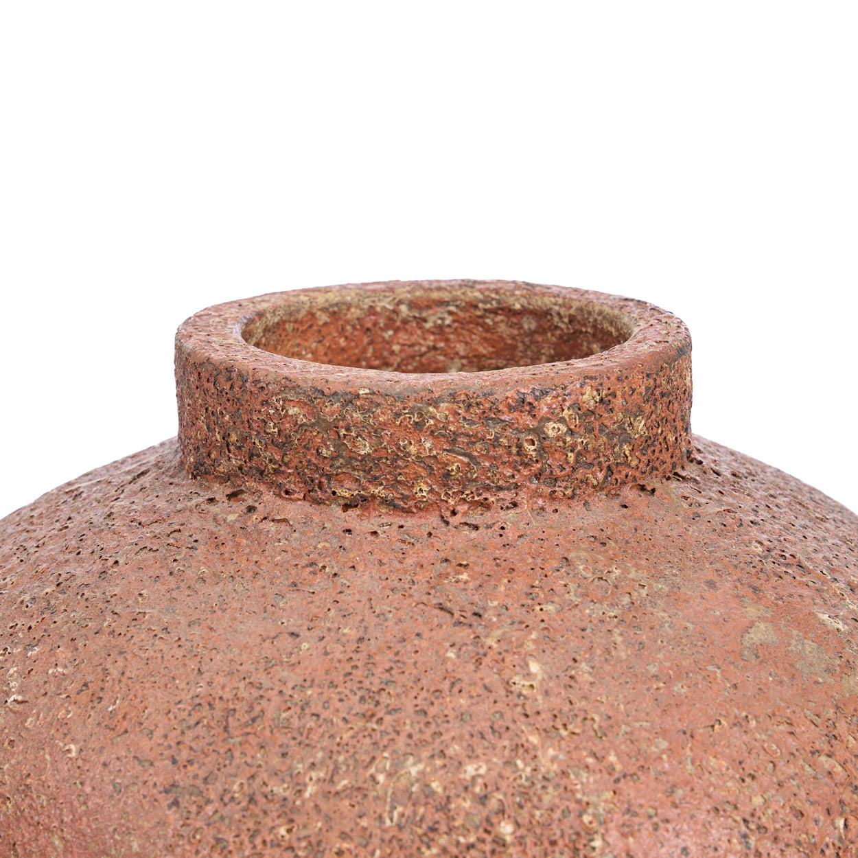 Close-up view of top of the rustic vase on a white background