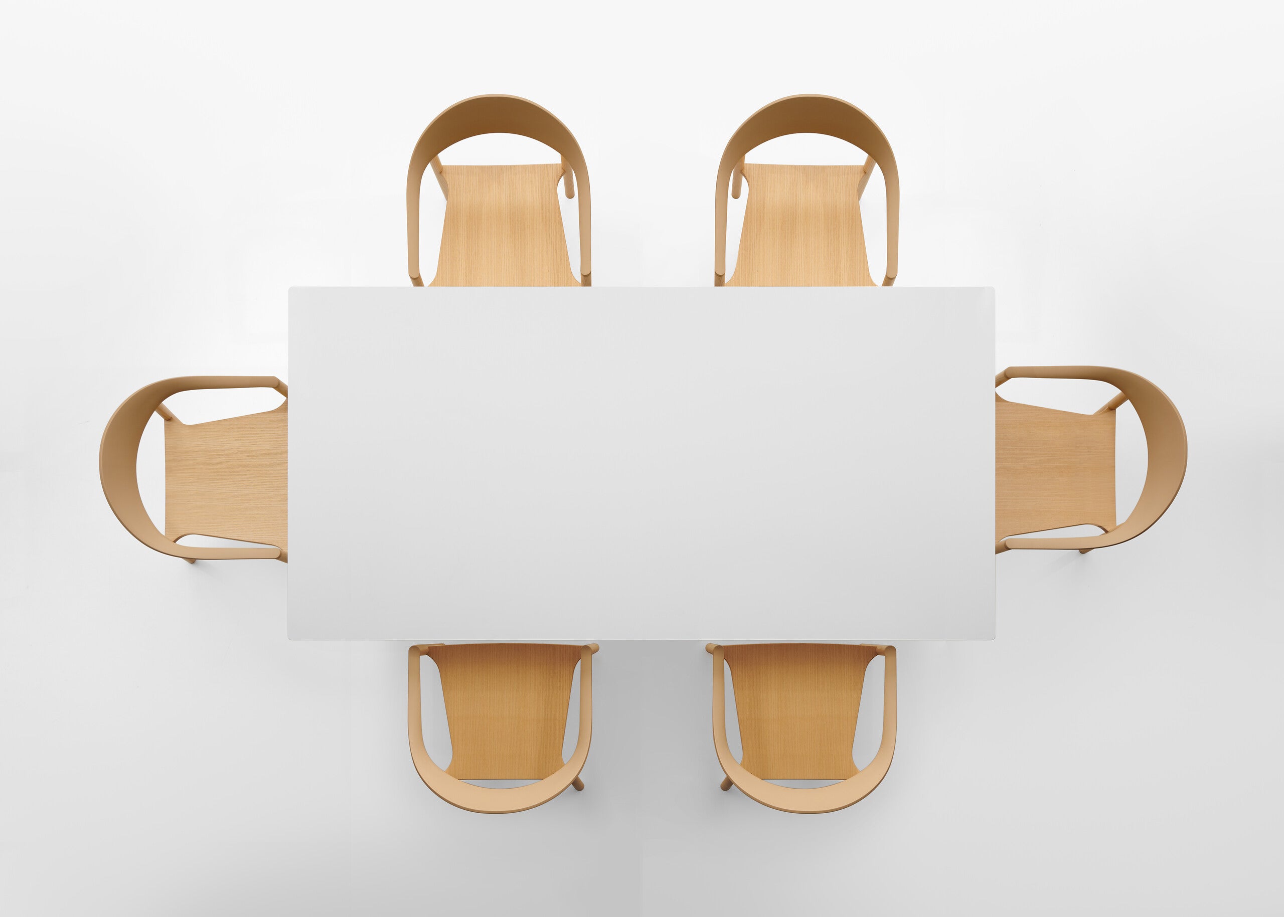 MONZA rectangle table with white HPL table top and natural colour chairs on a white background