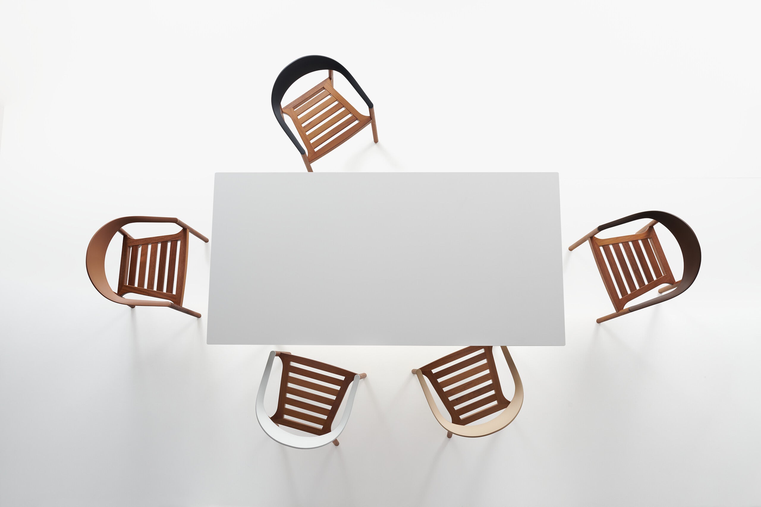 MONZA rectangle table with white HPL table top and brown chairs on a white background