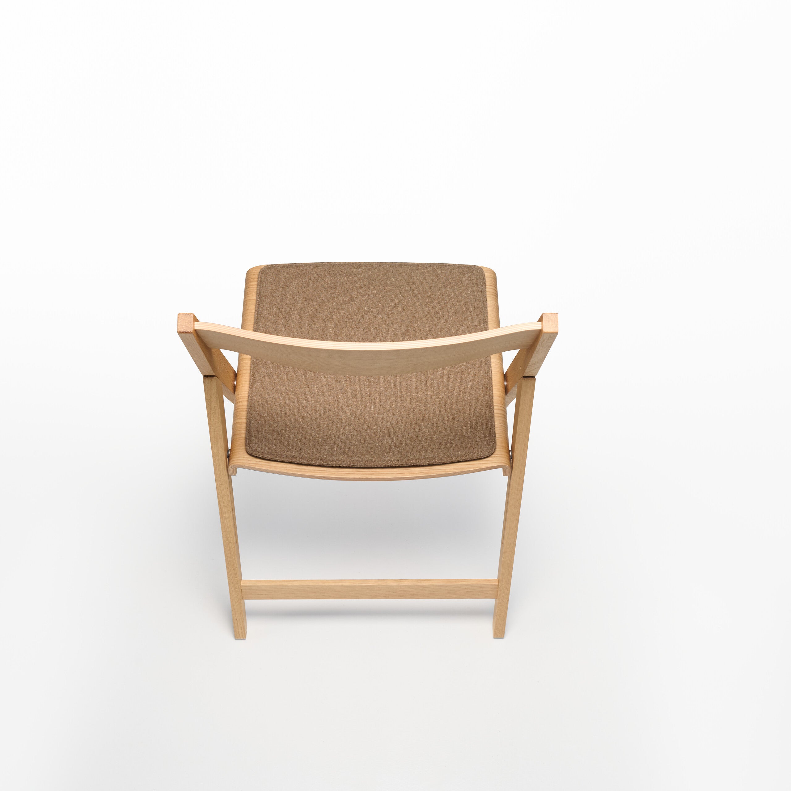 THEO chair with soft part and wooden frame on a white background
